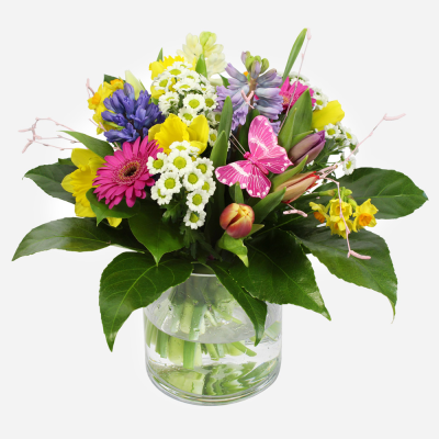 You're Wonderful - A spring hand tied in a glass vase in a lovely mix of flowers and colours. Only available during the Spring season.